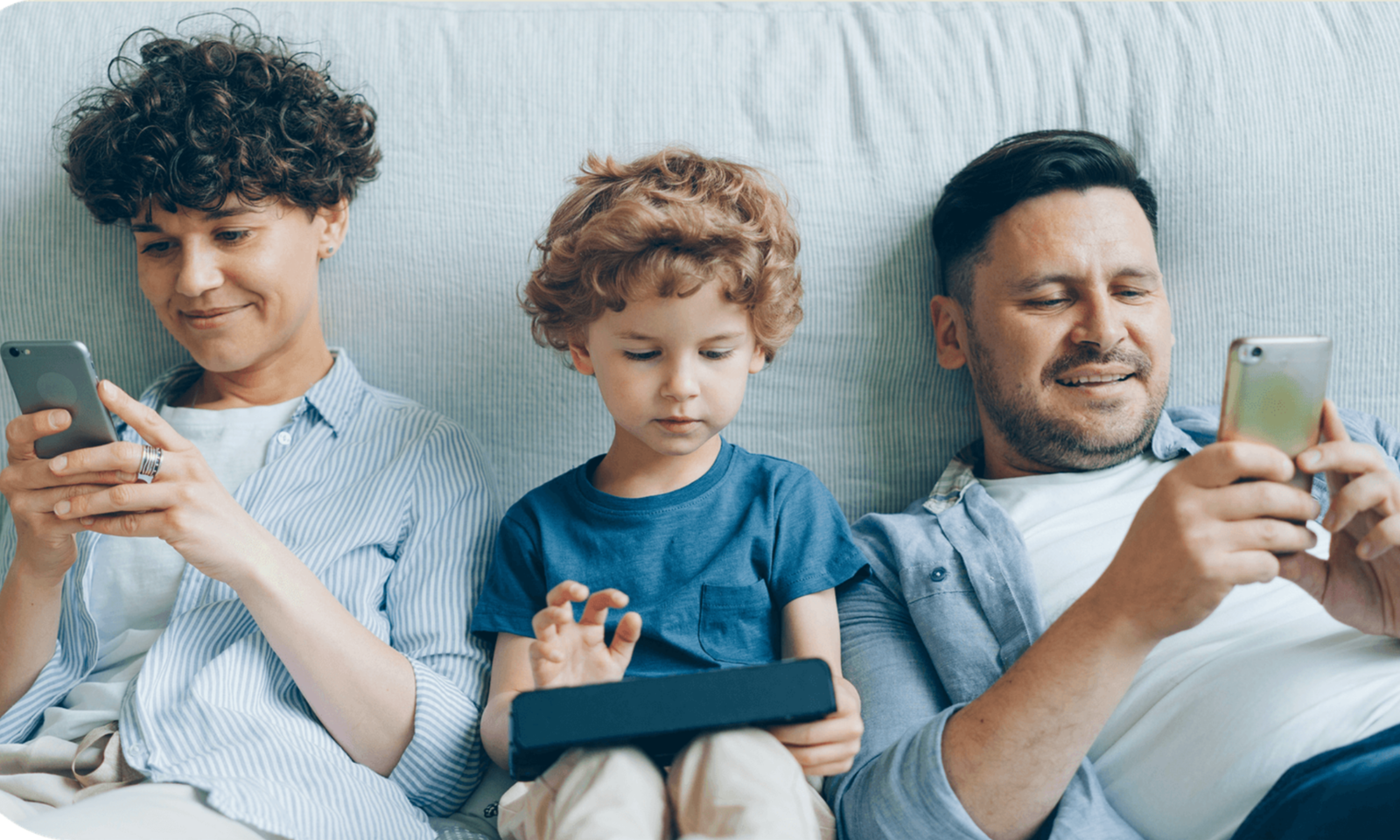 Father and sons reading Family-friendly books on their devices; Testimonial from a Homeschool Mom.